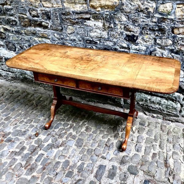 An Early 20th Century Walnut Sofa Table By Heals