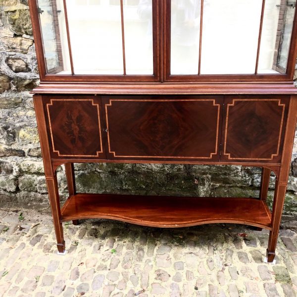 An Edwardian Mahogany Display Cabinet On Stand By Maples.