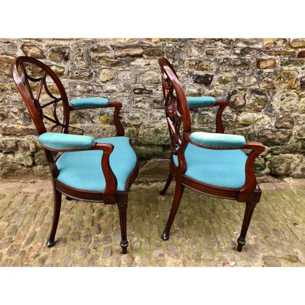 A Pair Of Sheraton Revival Elbow Chairs