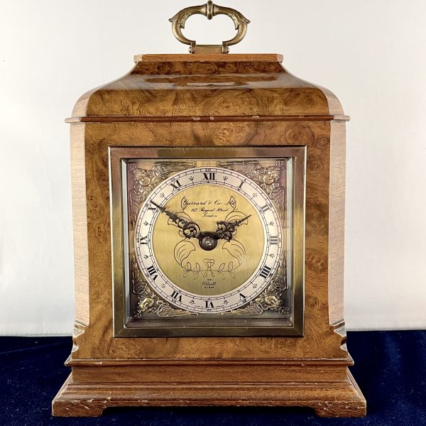 A Garrards Walnut Clock