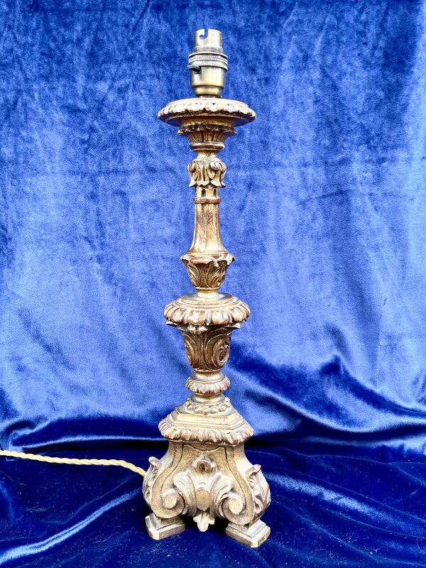An early 20th century Italian carved giltwood table lamp in the Baroque style